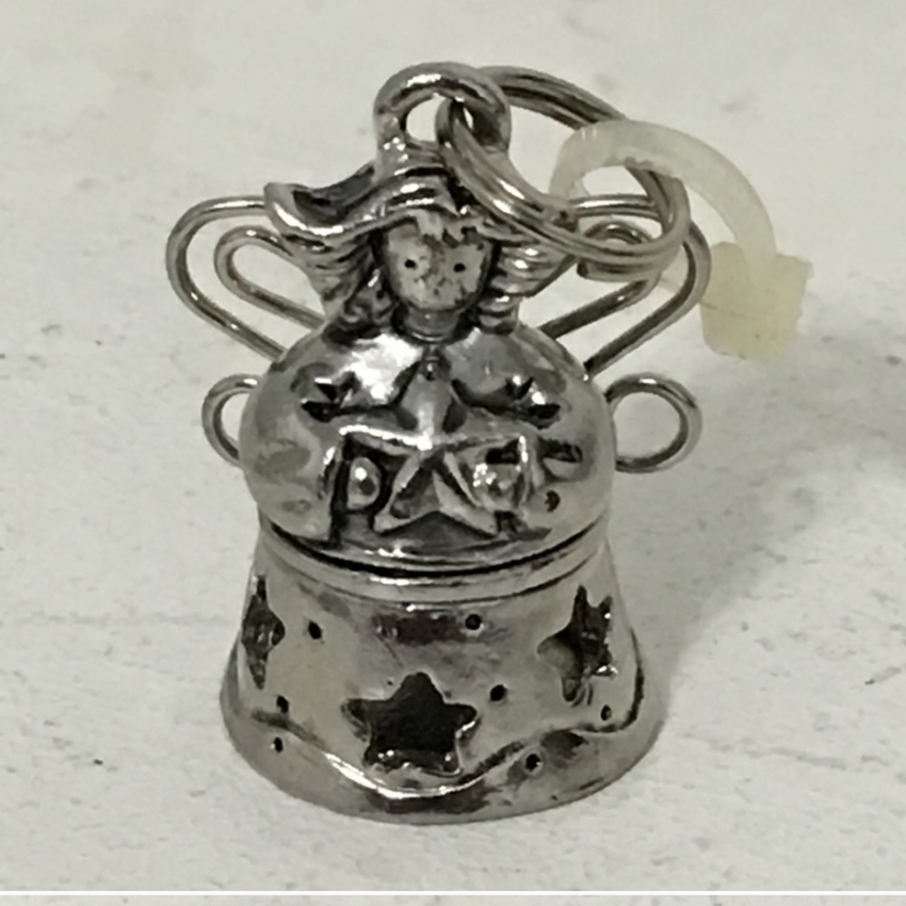 Perfume angel pin.